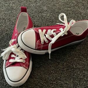 Red low top sneakers